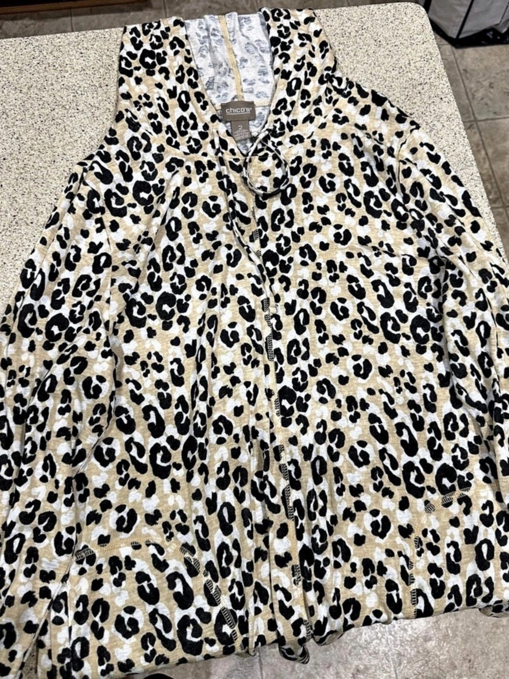 Chico's leopard print hooded long sleeve pullover in black and cream